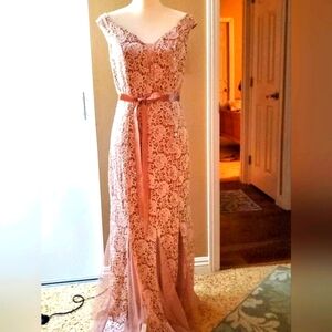 Beautiful New Cadalite brand dress size large. XL is sold.